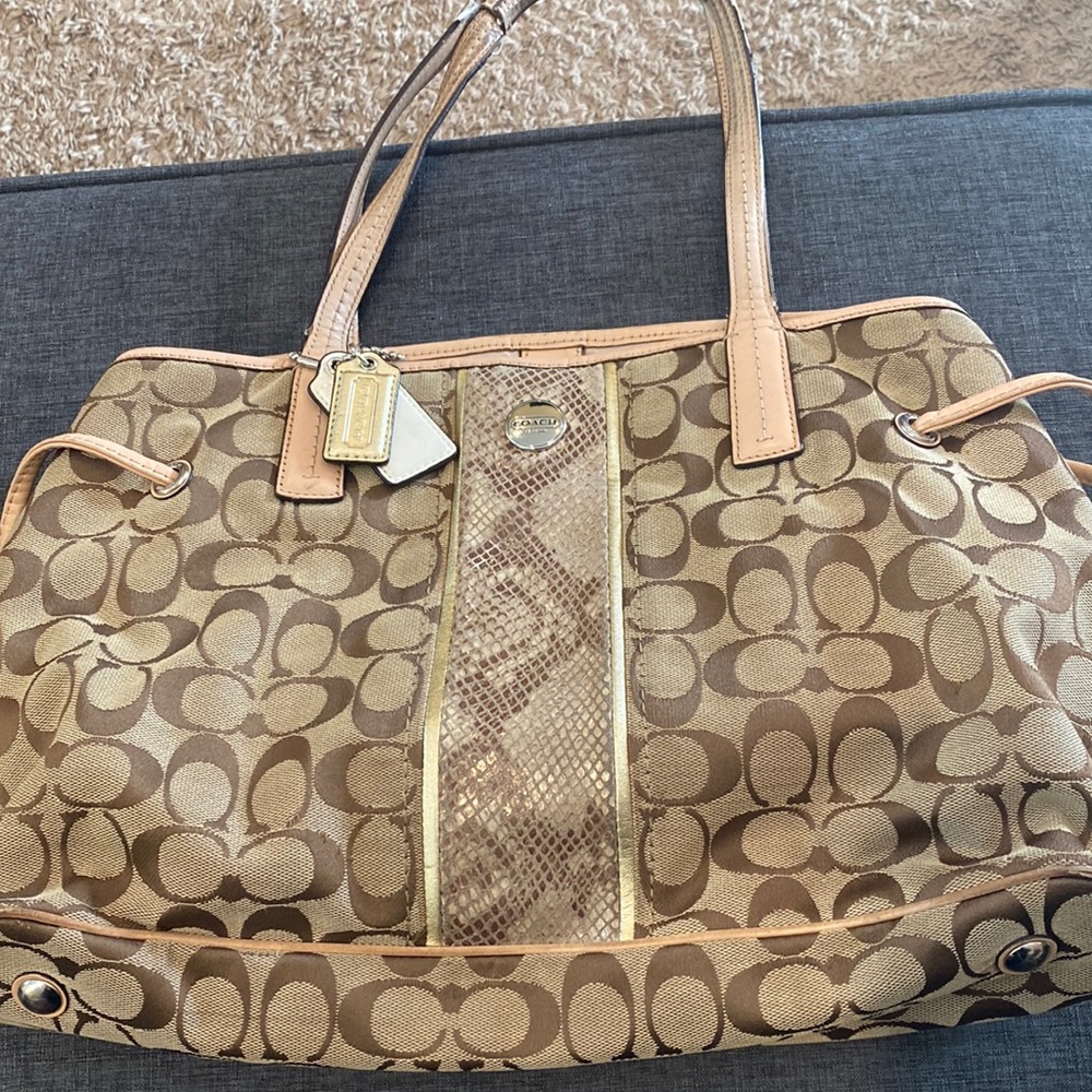 Coach classic beige tote with snake skin design on front